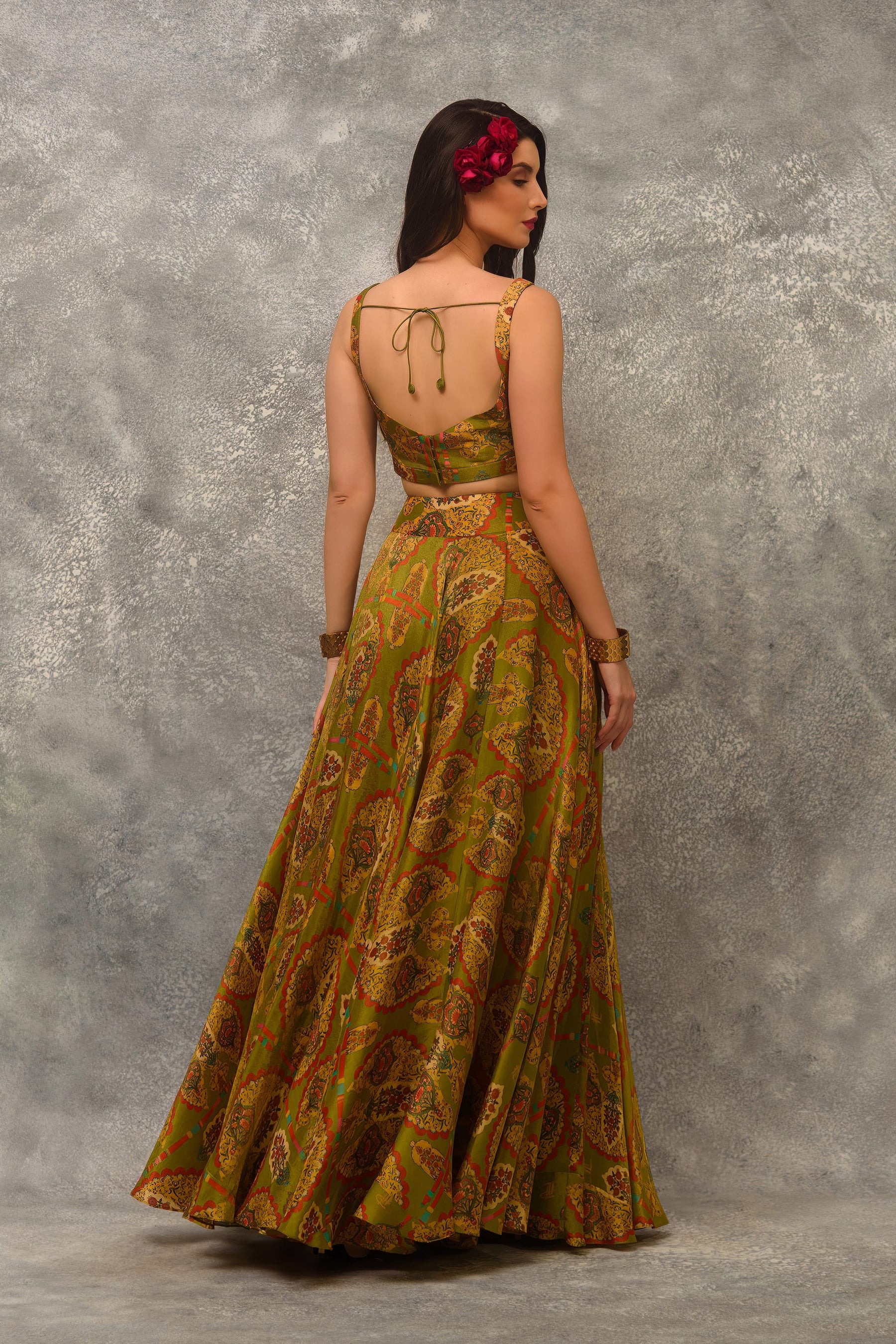 A line Printed skirt with  blouse and orangnza hand emb Cape