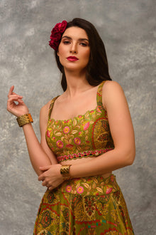 A line Printed skirt with  blouse and orangnza hand emb Cape