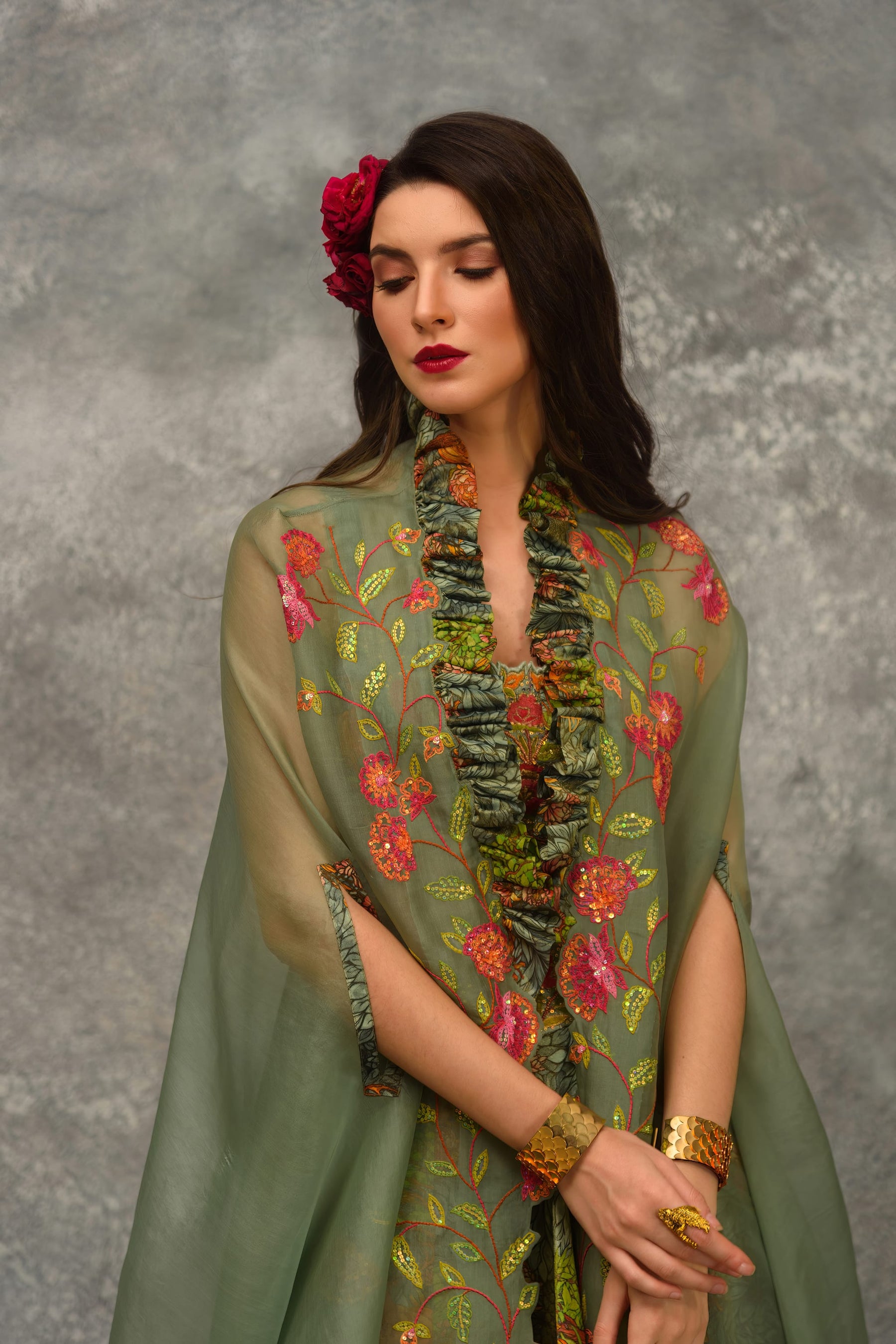 A line Printed skirt with strap blouse and orangnza hand emb Cape